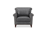 A classic wingback armchair upholstered in dark gray leather with brass nailhead trim and dark wood legs, shown against a plain white background.