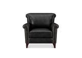 A classic black leather armchair with rolled arms, nailhead trim, and dark wood legs, shown against a plain white background.
