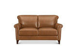 A classic two-seater loveseat sofa upholstered in warm tan leather, featuring rolled arms, nailhead trim, and dark wooden legs, shown against a plain white background.