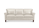 A three-seat cream-colored leather sofa with rolled arms, nailhead trim, and dark wood legs, shown against a plain white background.