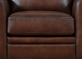 Close-up of a brown leather armchair