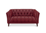 A classic Chesterfield loveseat sofa upholstered in deep burgundy leather, featuring button tufting on the backrest and seat, rolled arms, and dark wooden legs, shown against a plain white background.