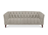 A light beige tufted loveseat sofa with dark wood legs, shown from a front-facing perspective on a white background.
