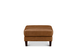 A square brown leather ottoman with dark wooden legs, shown from the front against a plain white background.
