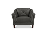 A brown leather armchair with a diamond-quilted backrest and rolled arms, shown from the front on a white background.