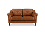 A two-seater loveseat sofa upholstered in warm cognac brown leather, featuring diamond-quilted back cushions and dark brown wooden legs, shown against a plain white background.