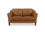 A two-seater loveseat sofa upholstered in warm tan leather with diamond-quilted back cushions, rolled arms, and dark wooden legs, shown against a plain white background.