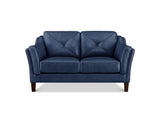A navy blue leather loveseat sofa with diamond tufting on the backrests, rolled arms, and dark brown wooden legs, shown against a plain white background.