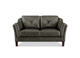 A two-seater loveseat sofa upholstered in dark gray leather with diamond-quilted back cushions, rolled arms, and dark wooden legs, shown against a plain white background.