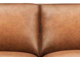 Close-up of a brown leather sofa