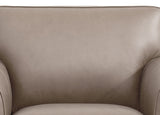 Close-up of a beige leather armchair