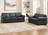 Brown leather sofa set in a living room with a rug and bookshelf.