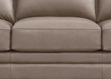 Close-up of a beige leather sofa