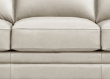 Close-up of a beige leather sofa