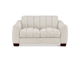 An off-white upholstered loveseat with vertical channel tufting on the backrest and seat cushions, supported by dark brown wooden legs, shown against a plain white background.
