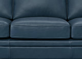 Close-up of a blue leather sofa