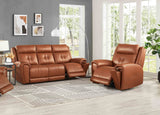 Brown leather reclining sofa set in a living room with large windows.