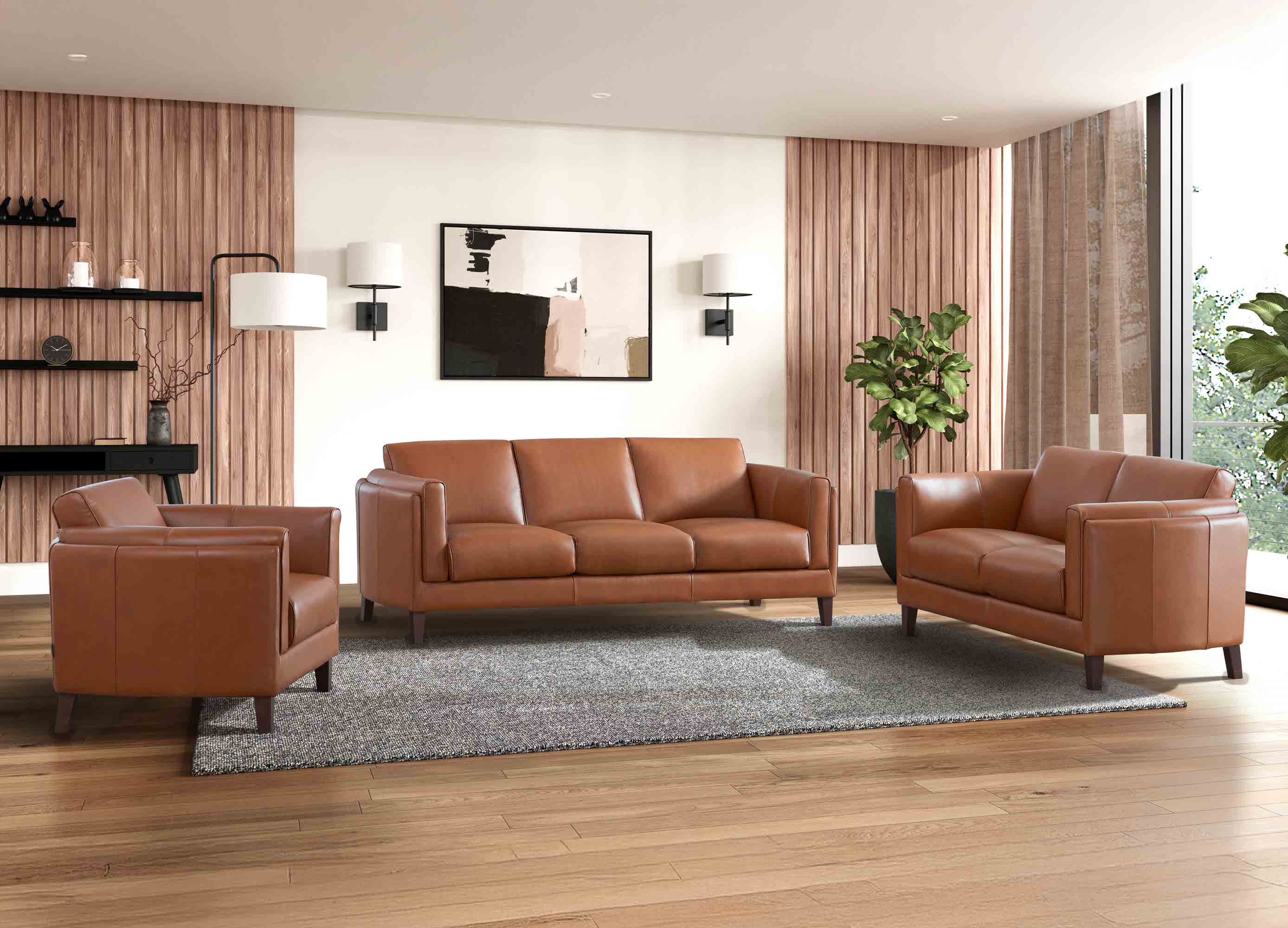 Brown leather sofa set in a modern living room with wooden floor and large windows.