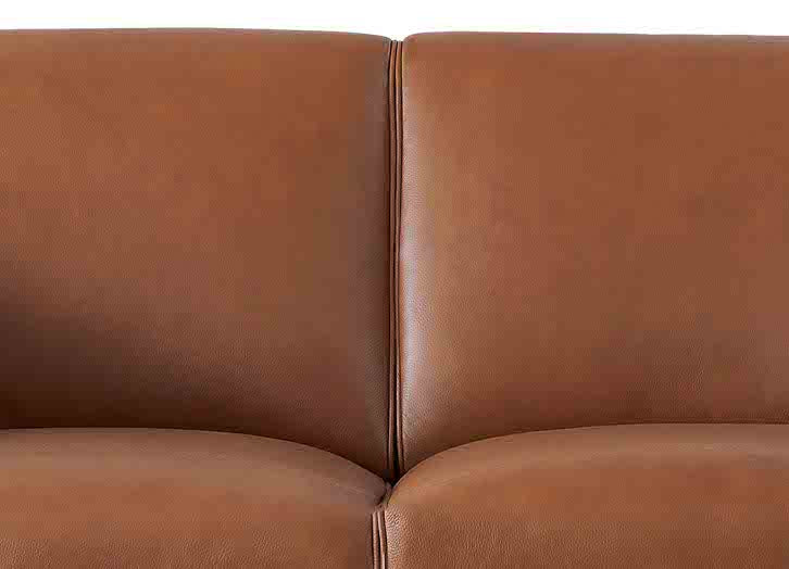Close-up of a brown leather sofa