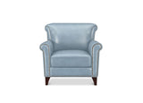 A light blue leather wingback armchair with dark brown wooden legs and silver nailhead trim, shown against a plain white background.