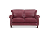 A classic two-seater loveseat sofa upholstered in burgundy leather with dark wood legs and silver nailhead trim on the arms, shown against a plain white background.