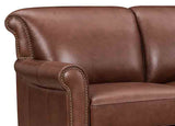Brown leather sofa with nailhead trim on a white background