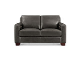 A dark gray leather loveseat sofa with square arms and dark brown wooden feet, shown from a front-facing perspective on a white background.
