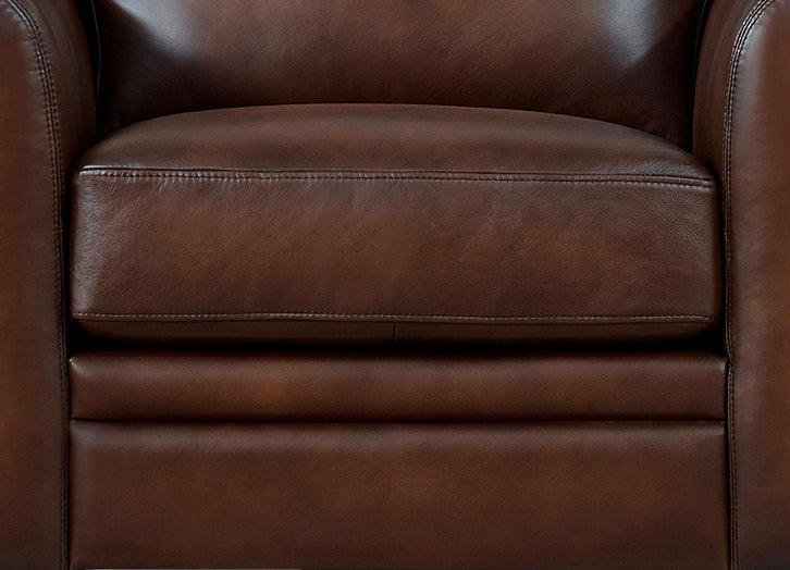 Close-up of a brown leather armchair