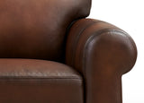 Close-up of a brown leather armchair with visible stitching