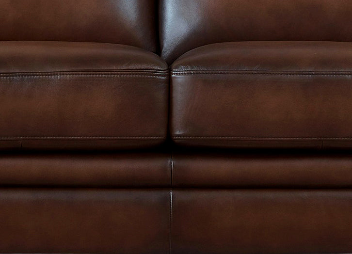 Close-up of a brown leather sofa