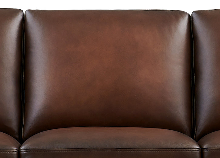 Close-up of a brown leather sofa