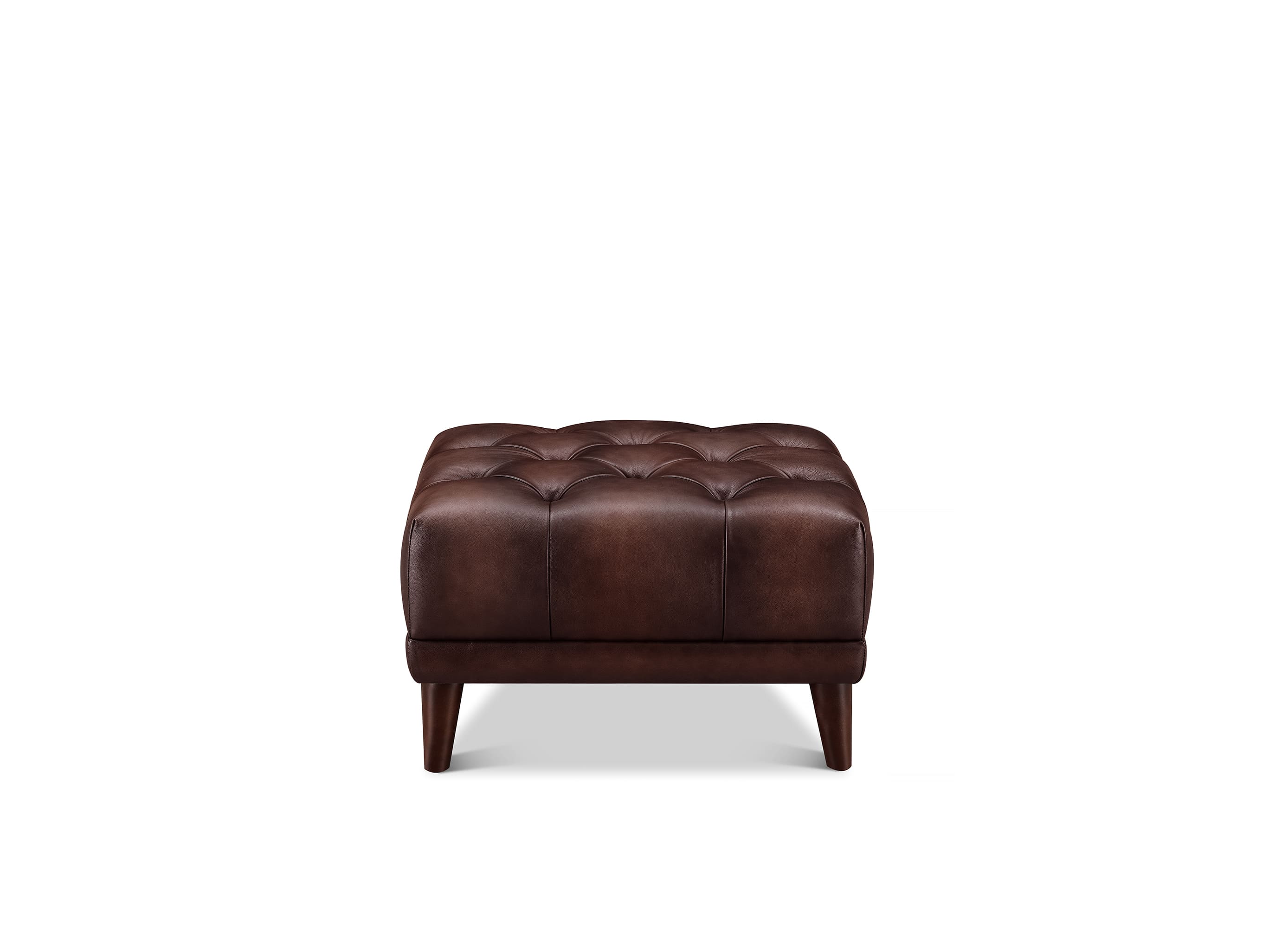 A dark brown tufted leather ottoman with short wooden legs, shown from the front against a plain white background.