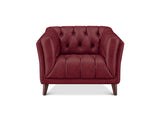 A tufted armchair upholstered in deep burgundy leather with dark wood legs, shown against a plain white background.