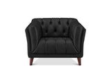 A black tufted leather armchair with dark brown wooden legs, shown from a front-facing perspective on a white background.