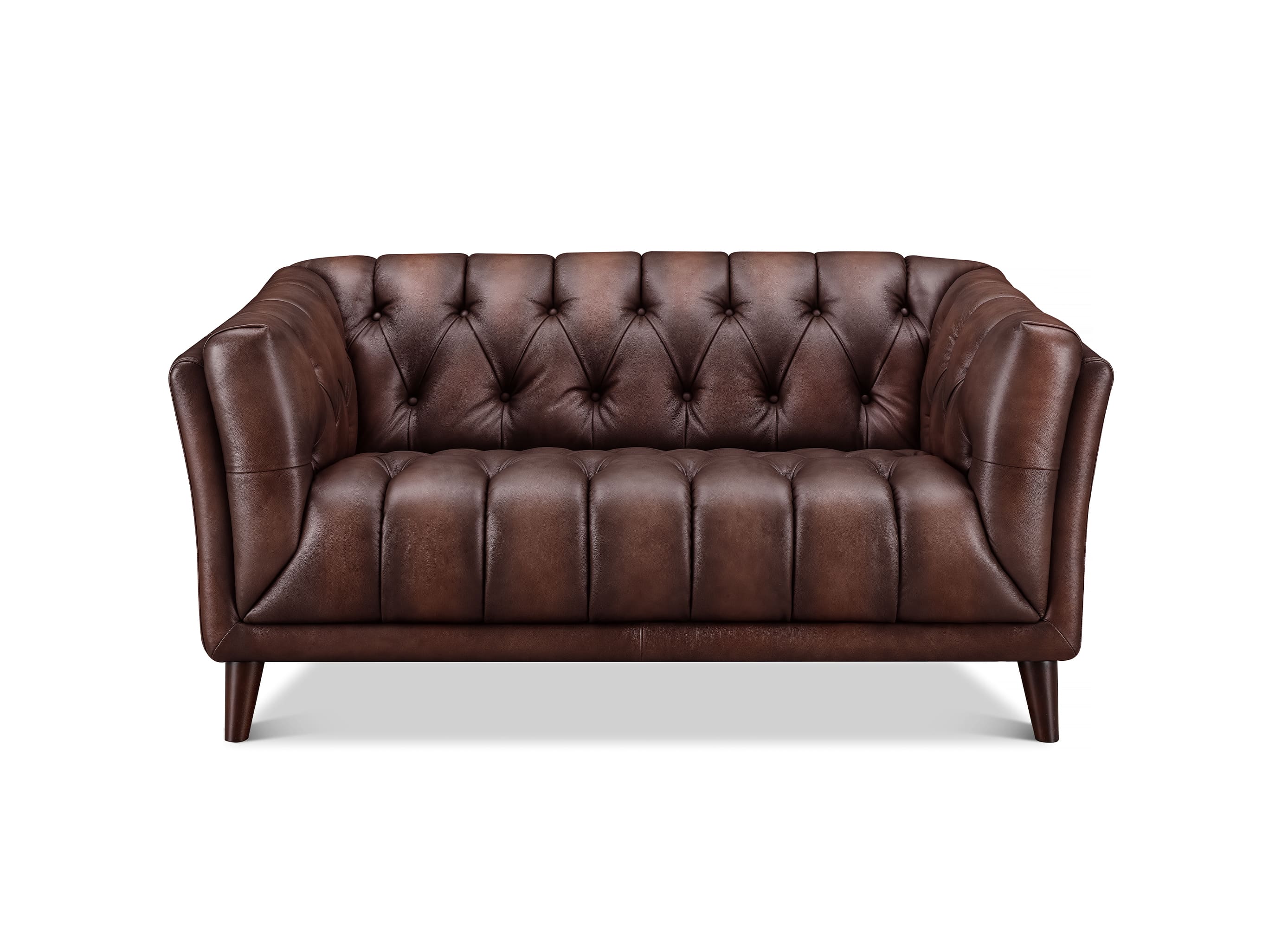 A classic brown leather loveseat sofa with deep button tufting on the backrest and seat, supported by dark wooden legs, shown against a plain white background.