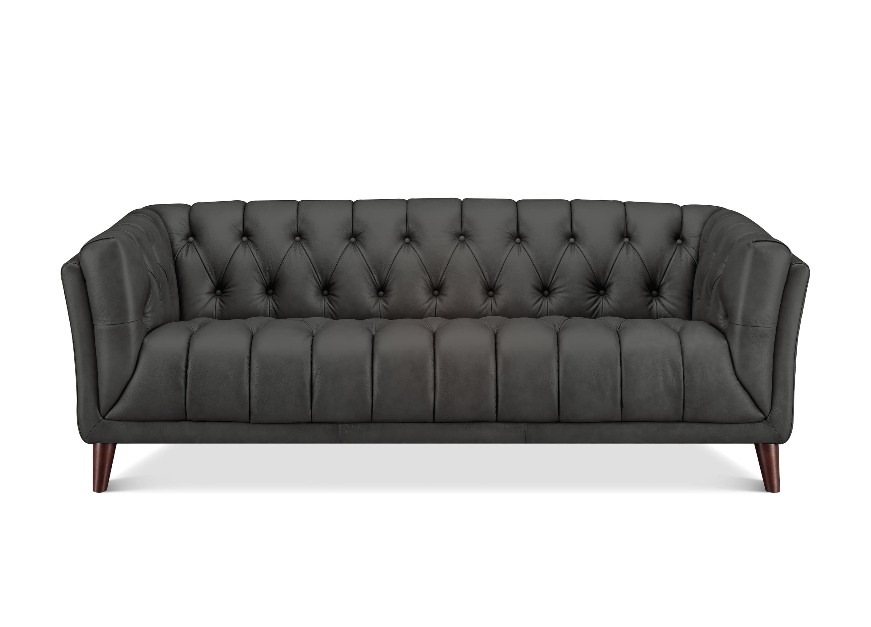 A dark gray tufted leather sofa with rolled arms and dark wooden legs, shown from a front-facing perspective on a white background.