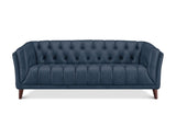 A navy blue tufted leather sofa with dark brown wooden legs, shown from a front-facing perspective against a plain white background.