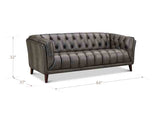 Gray tufted sofa with dimensions on a white background