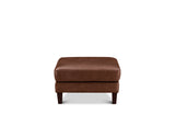 A square brown leather ottoman with dark wooden legs, shown from the front against a plain white background.