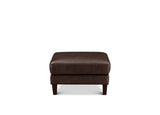 A dark brown upholstered ottoman with a square cushion and short dark legs, shown against a plain white background.