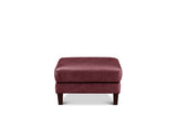 A square upholstered ottoman in a deep burgundy fabric, supported by two dark wooden legs, shown against a plain white background.