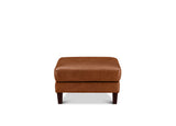 A square brown leather ottoman with dark wooden legs, shown from the front against a plain white background.