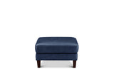 A square navy blue upholstered ottoman with dark brown wooden legs, shown from the front against a plain white background.
