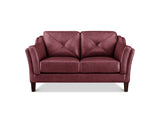 A two-seater loveseat sofa upholstered in burgundy leather with diamond-quilted back cushions, rolled arms, and dark wooden legs, shown against a plain white background.