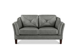 A gray faux leather loveseat sofa with diamond-quilted back cushions, rolled arms, and dark brown wooden legs, shown against a plain white background.