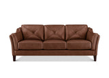 A three-seat brown leather sofa with diamond-quilted back cushions and dark wooden legs, shown against a plain white background.
