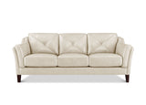 A three-seat sofa upholstered in light beige leather with diamond-quilted back cushions and dark brown wooden legs, shown against a plain white background.