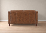 A brown leather loveseat shown from the back, positioned against a neutral beige wall and light wood floor.