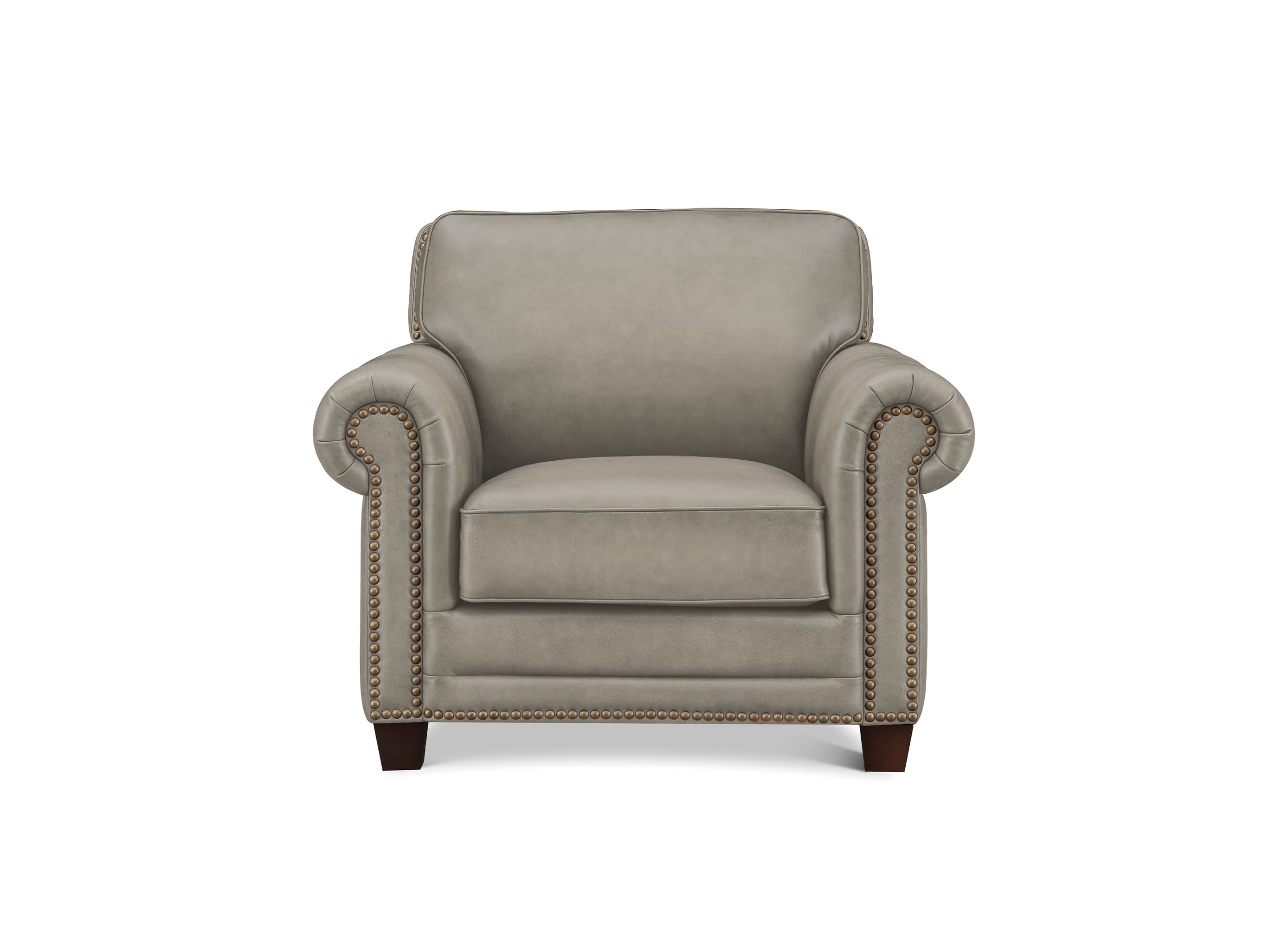 A classic upholstered armchair in a light taupe-gray fabric, featuring rolled arms with nailhead trim, a thick seat cushion, and dark wood legs, shown against a plain white background.