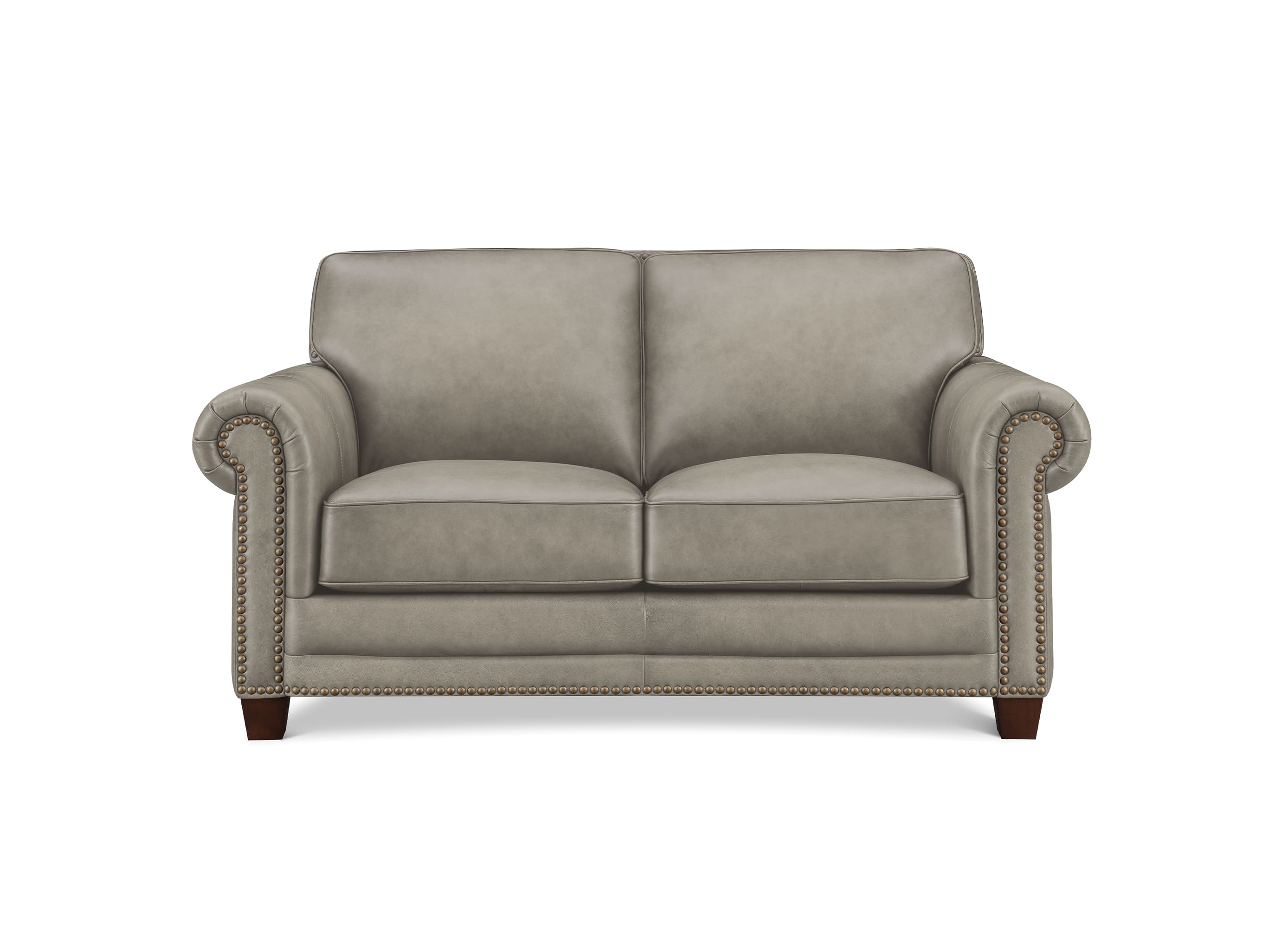 A classic two-seater loveseat sofa upholstered in light taupe gray fabric, featuring rolled arms with nailhead trim and dark brown wooden legs, shown against a plain white background.